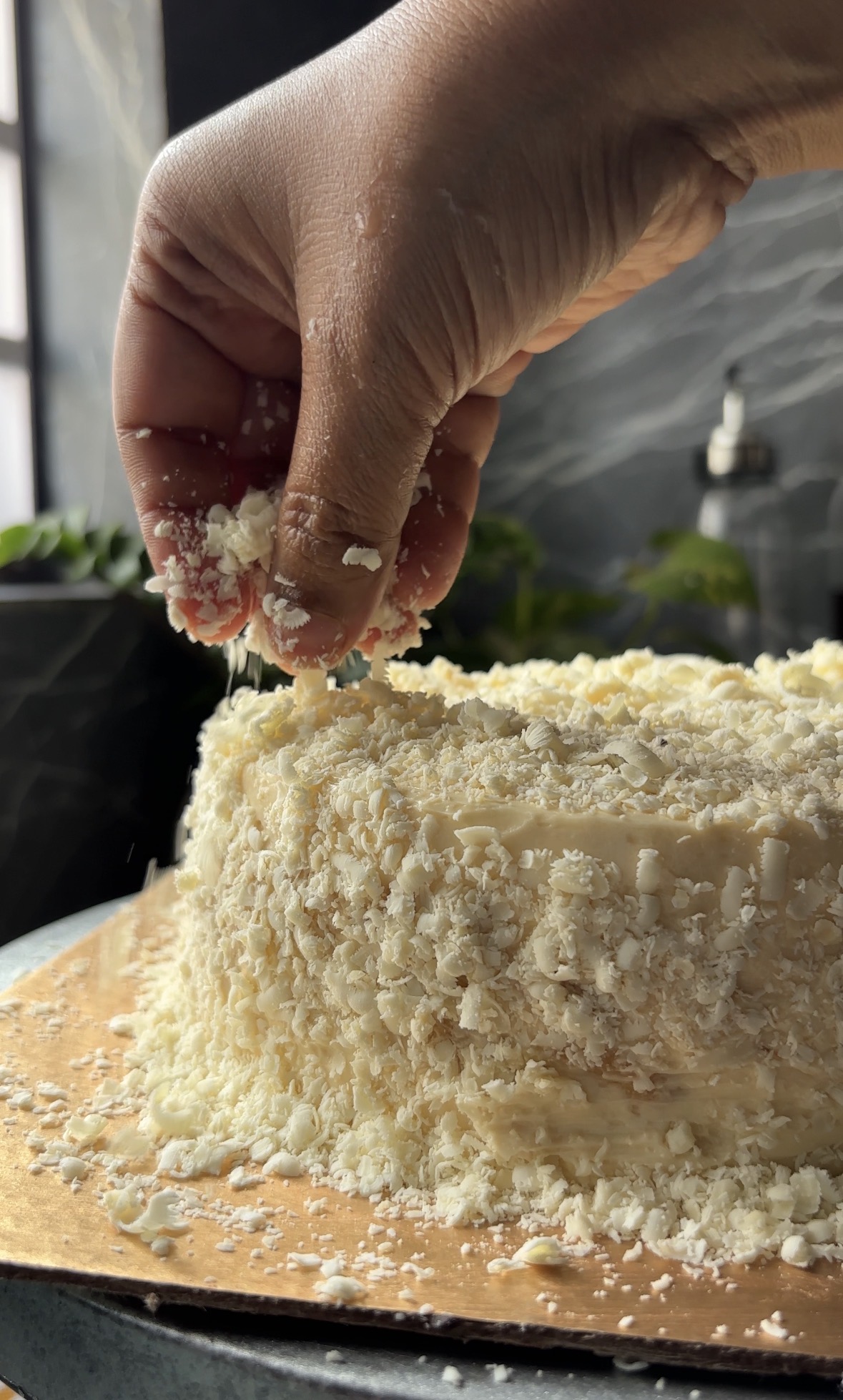 Soft fluffy cheese cake with condensed milk frosting and grated cheese topping