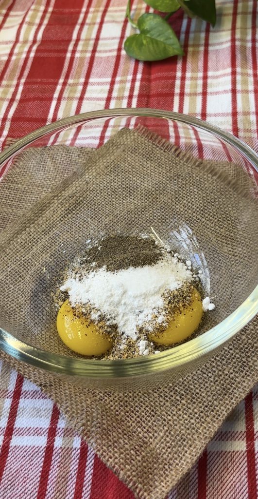 Ingredients for egg mayonnaise placed inside a tall glass jar before blending.